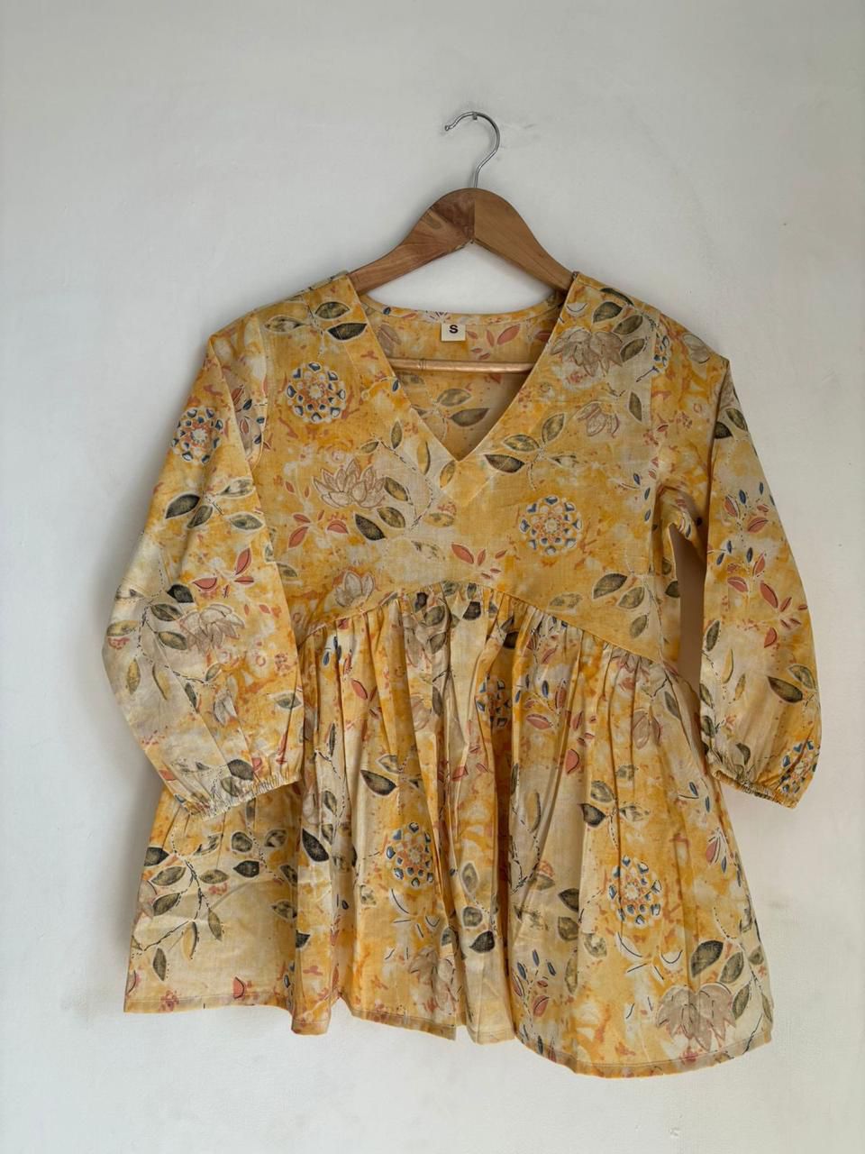 Pastel yellow peplum short top