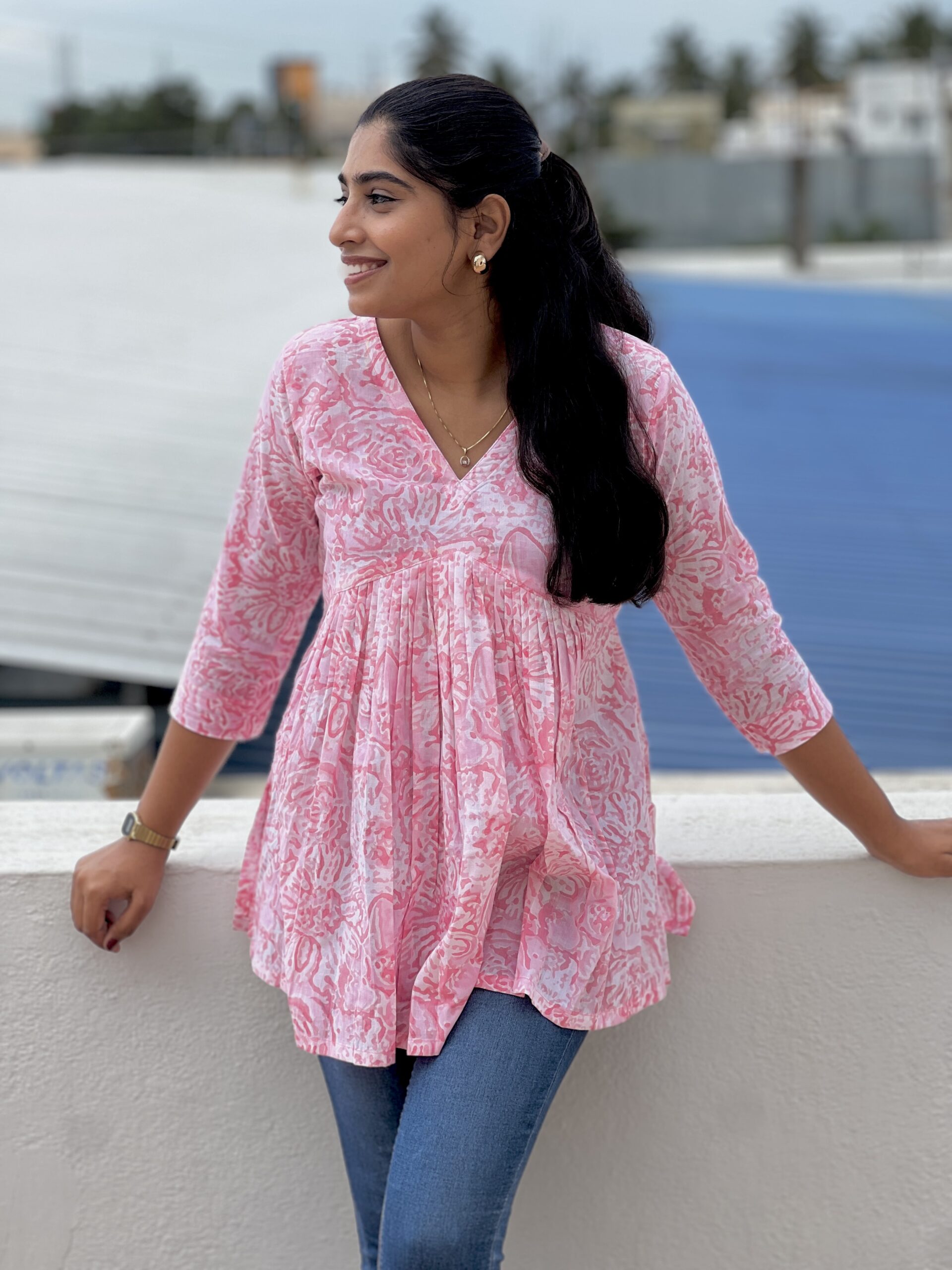 Marble pink inverted yoke short top